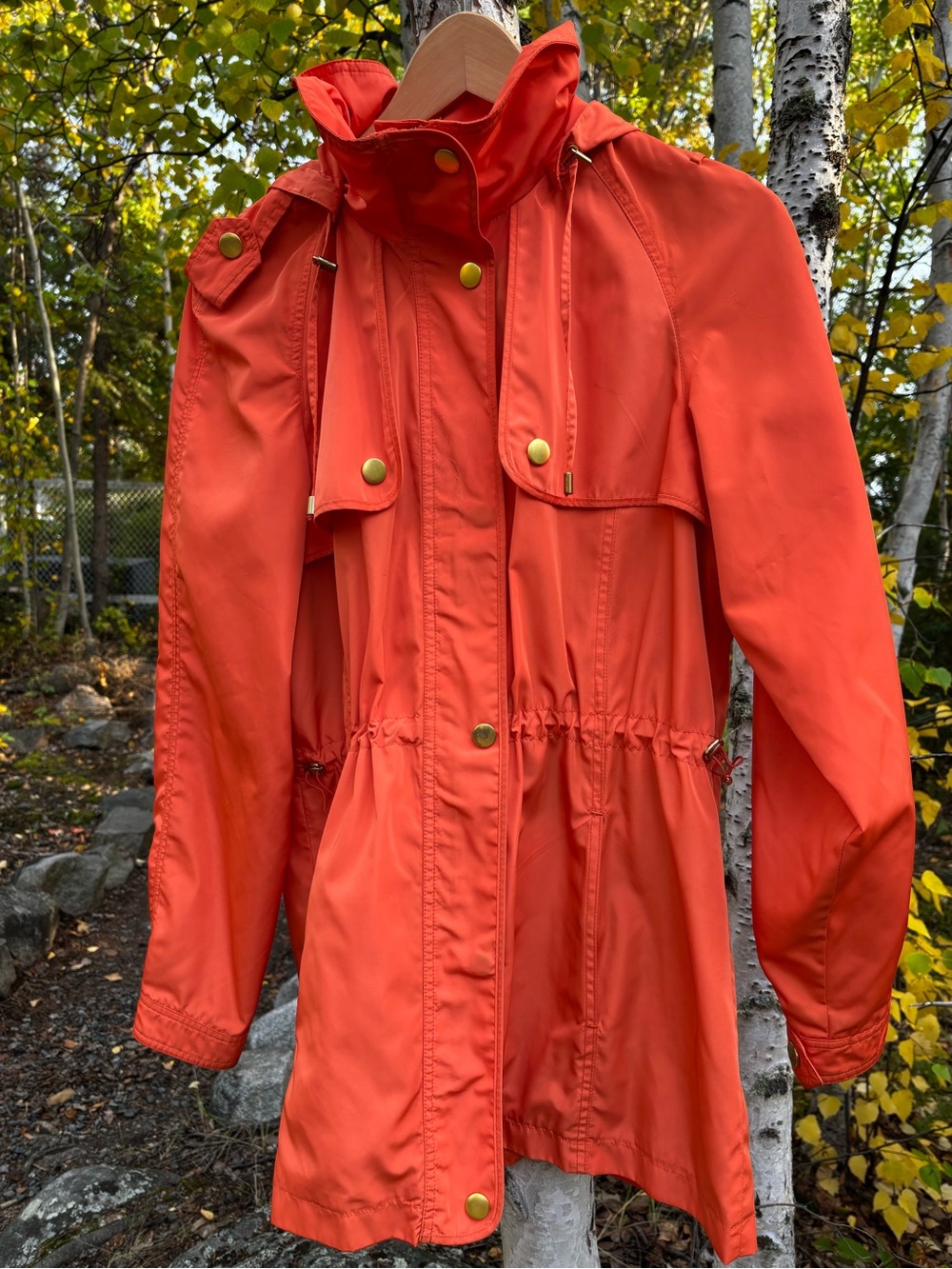 Vivid Orange Trench with gold accents